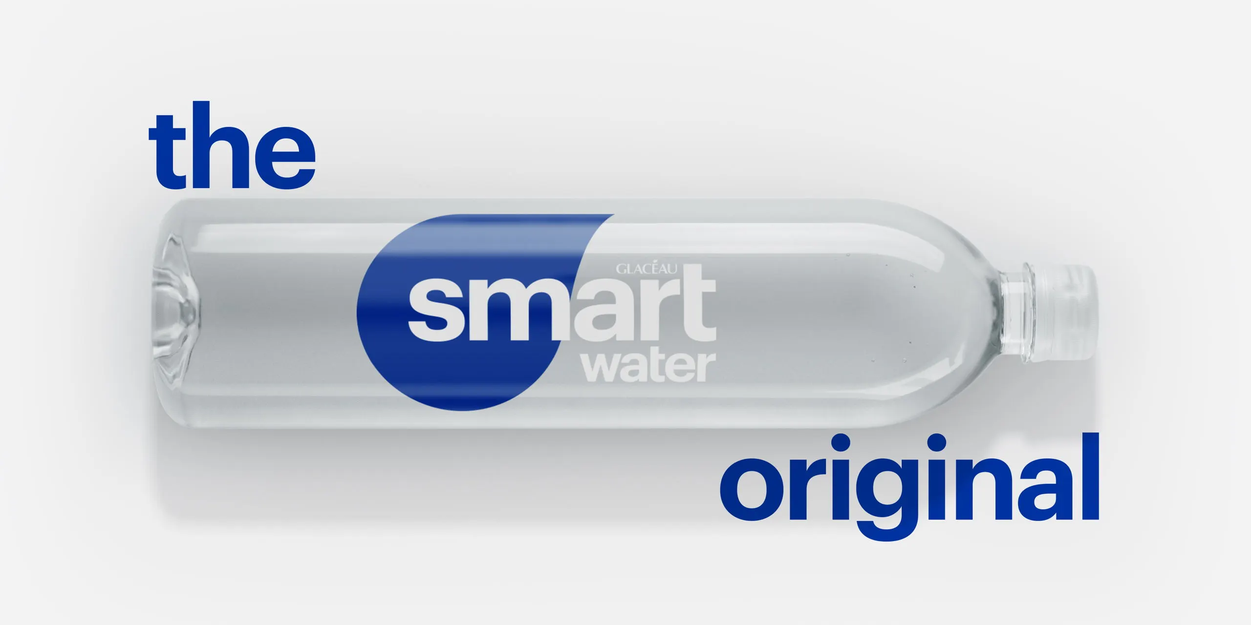 Smartwater's original clear bottle packaging design with blue and white minimalist branding