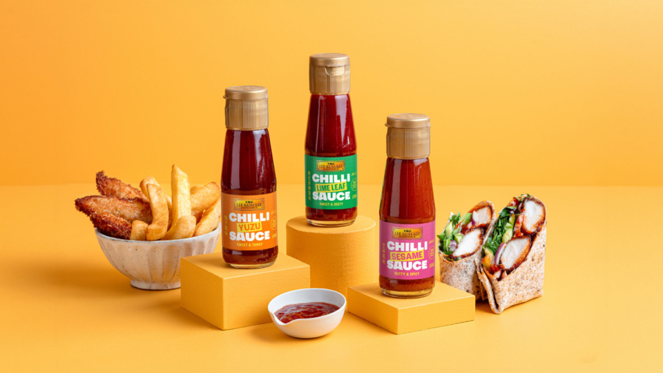 Lee Kum Kee chilli sauce packaging design with gold plaque heritage logo