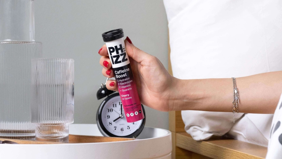 Phizz Caffeine Boost packaging design and brand identity lifestyle shot